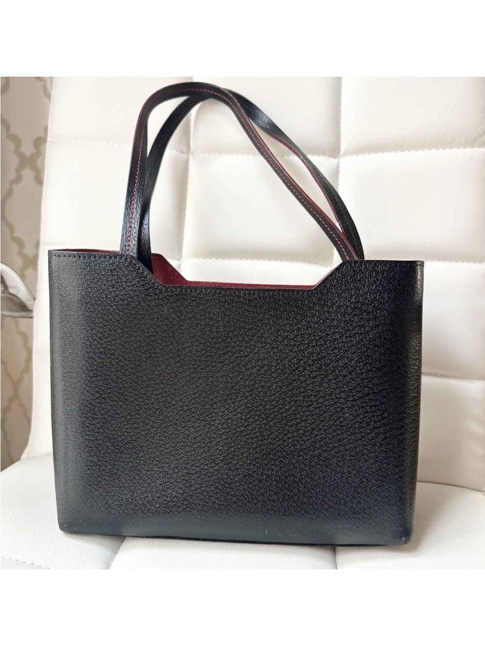 Tumi Small Black Leather Handbag/Tote bag with Burgundy Interior